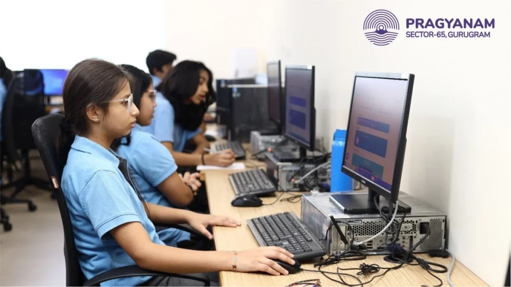 A student is sitting in front of a computer system, focused on the screen, engaged in online learning or completing a digital assignment A student is sitting in front of a computer system, focused on the screen, engaged in online learning or completing a digital assignment